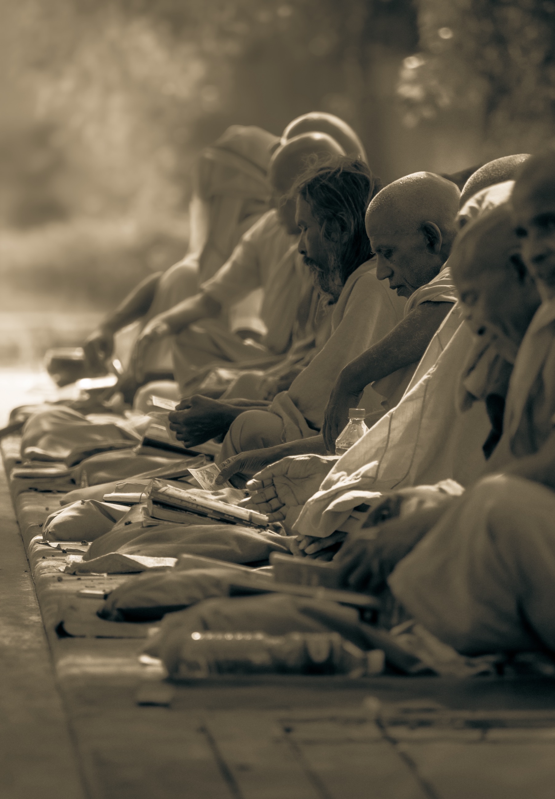 A row of seated elders, sepia